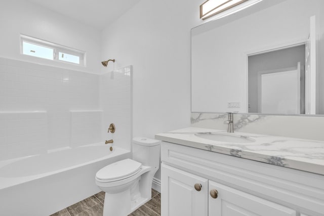 2929 W 28th St, Rosamond, CA 93560 - bathroom featuring toilet, vanity, shower / bathtub combination, and wood finish floors