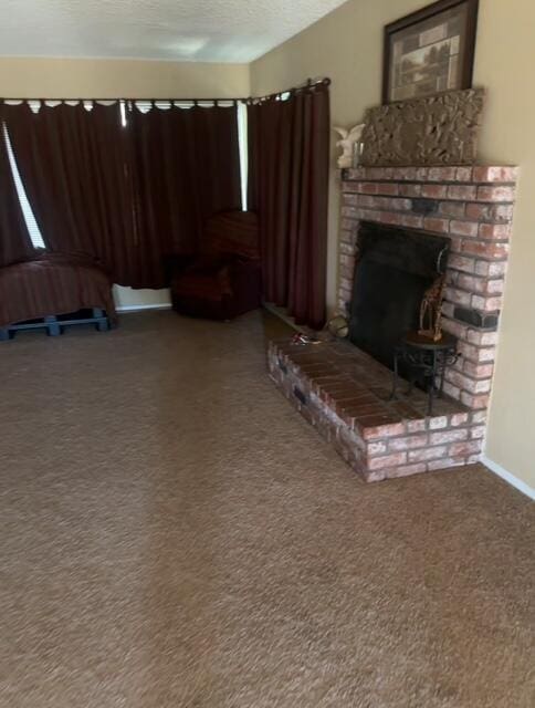 16466 Wells Fargo Ave, Palmdale, CA 93591 - living room featuring carpet flooring, a textured ceiling, and a brick fireplace
