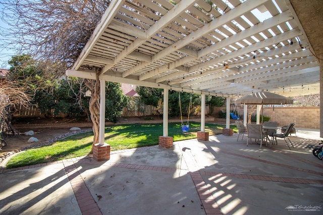 view of patio / terrace with outdoor dining area, a fenced backyard, and a pergola