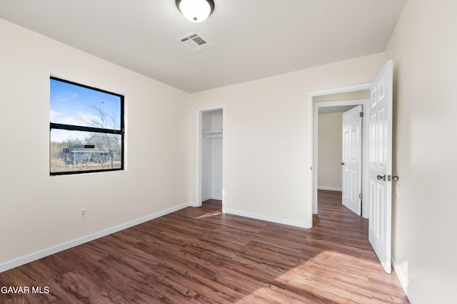 43331 Fairglen Rd, Lancaster, CA 93535 - unfurnished bedroom featuring wood finished floors and a closet