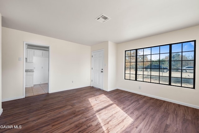 43331 Fairglen Rd, Lancaster, CA 93535 - empty room featuring dark wood-style flooring