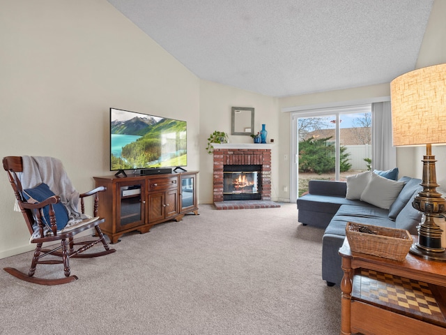 carpeted living area with baseboards, a textured ceiling, a fireplace, and vaulted ceiling