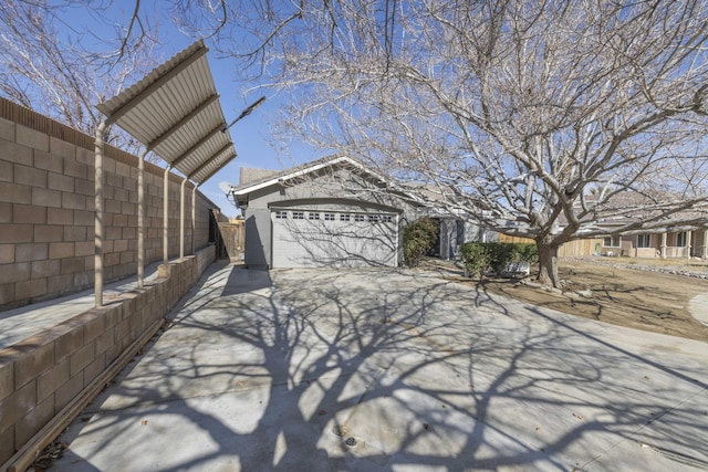 exterior space featuring a garage