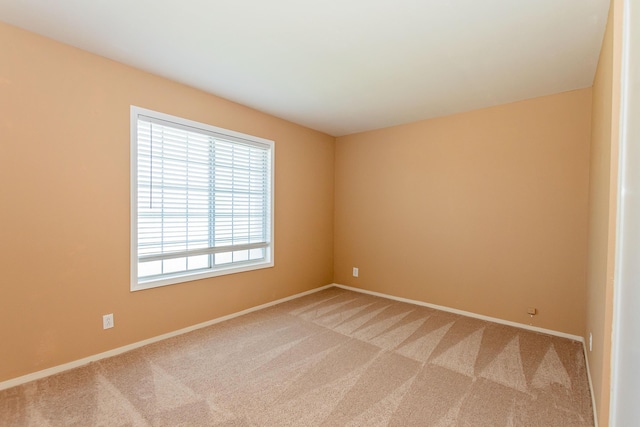 6310 Treehaven Ct, Lancaster, CA 93536 - empty room with light colored carpet and baseboards