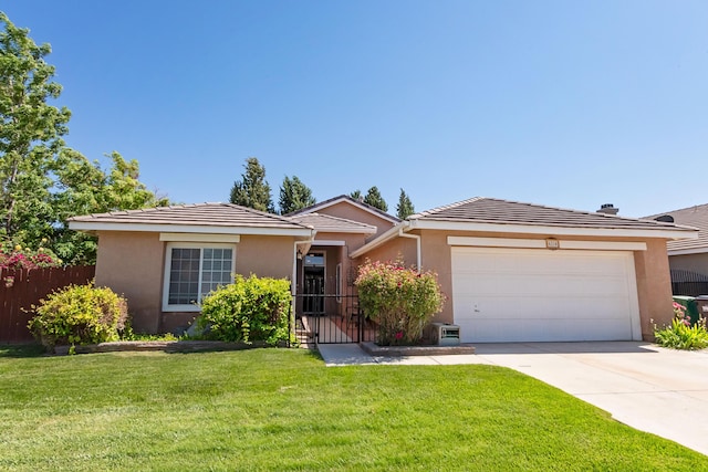 6310 Treehaven Ct, Lancaster, CA 93536 - ranch-style home with an attached garage, stucco siding, and driveway