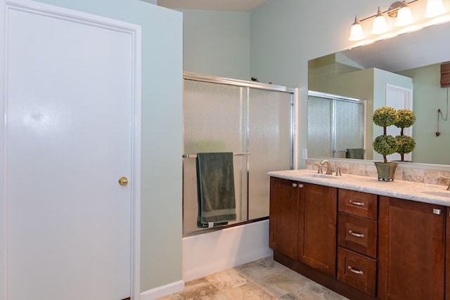 6310 Treehaven Ct, Lancaster, CA 93536 - bathroom featuring combined bath / shower with glass door and double vanity