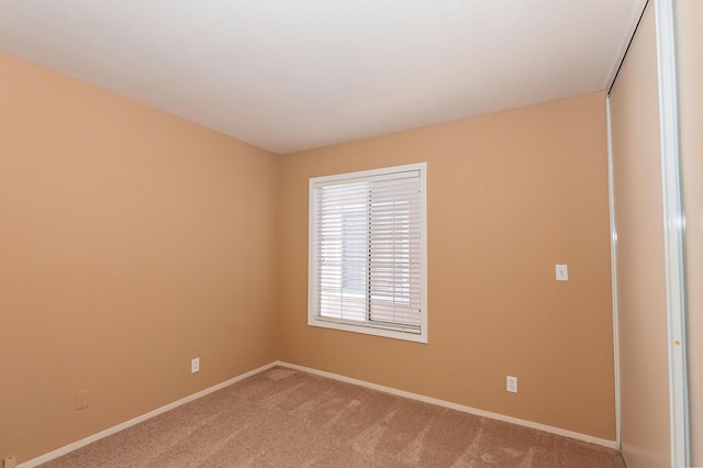 6310 Treehaven Ct, Lancaster, CA 93536 - carpeted empty room with baseboards