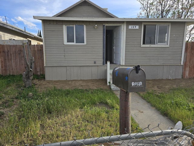 view of front of property with fence