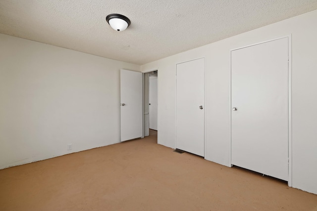 23610 Lancaster Rd, Lancaster, CA 93536 - unfurnished bedroom with light carpet and a textured ceiling