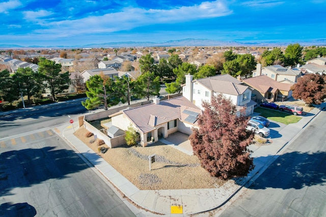 bird's eye view with a residential view and a mountain view