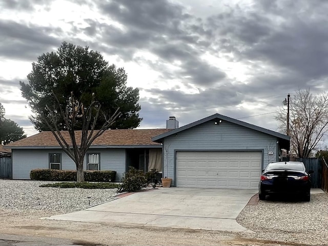 single story home featuring a garage