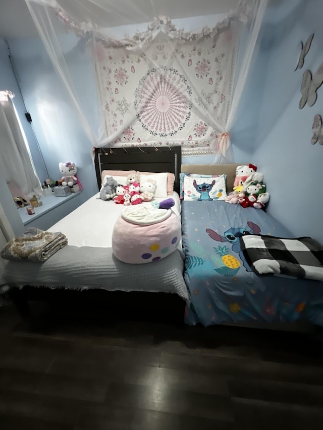 bedroom featuring hardwood / wood-style floors