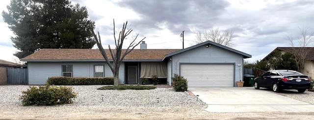 ranch-style home with a garage