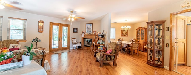 43710 Shiloh Ln, Lancaster, CA 93535 - living area featuring ceiling fan, light wood-style flooring, and plenty of natural light