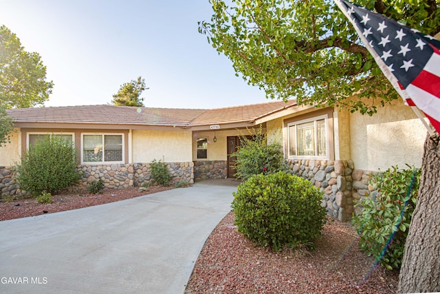 43710 Shiloh Ln, Lancaster, CA 93535 - ranch-style home with stone siding and stucco siding