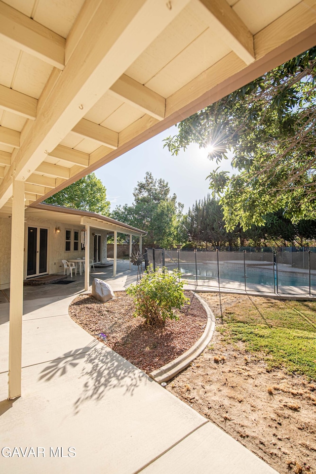 43710 Shiloh Ln, Lancaster, CA 93535 - view of home's community featuring a patio area and a swimming pool