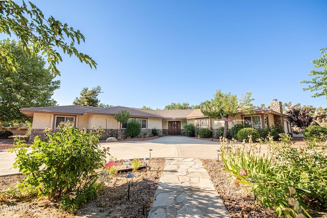 43710 Shiloh Ln, Lancaster, CA 93535 - ranch-style house with stucco siding, stone siding, and a chimney