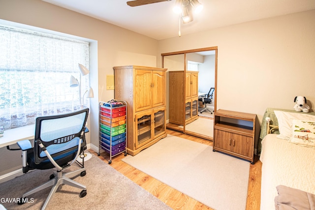43710 Shiloh Ln, Lancaster, CA 93535 - office featuring light wood-style flooring and a ceiling fan