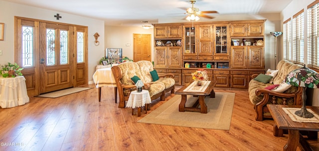 43710 Shiloh Ln, Lancaster, CA 93535 - living room featuring plenty of natural light, ceiling fan, and light wood-type flooring