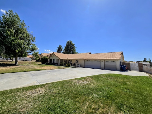 35823 E 48th St, Palmdale, CA 93552 - single story home with a garage, driveway, a tiled roof, and stucco siding