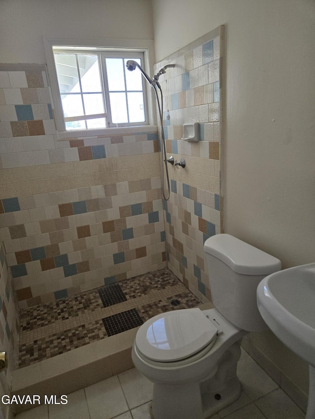 44960 E 3rd St, Lancaster, CA 93535 - bathroom with a shower stall and tile patterned flooring