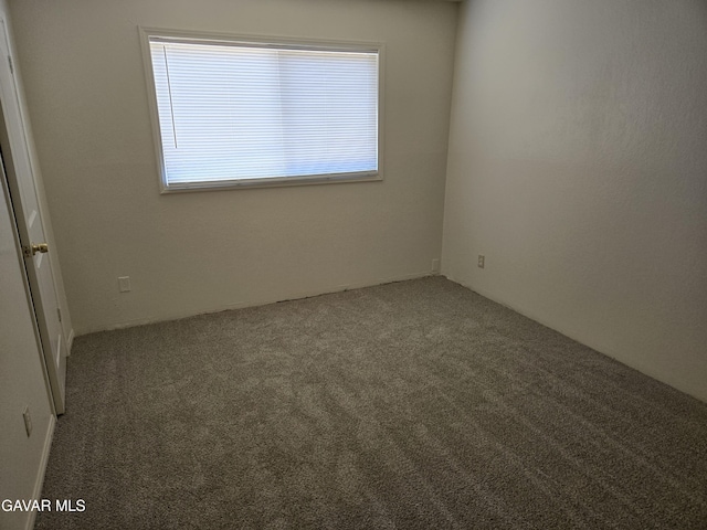 44960 E 3rd St, Lancaster, CA 93535 - view of carpeted spare room