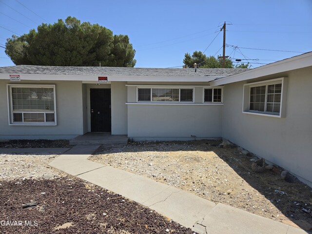 44960 E 3rd St, Lancaster, CA 93535 - entrance to property with stucco siding