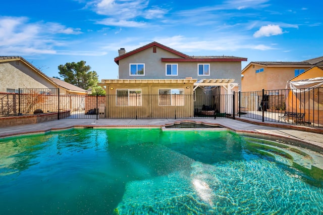 view of swimming pool with a pergola