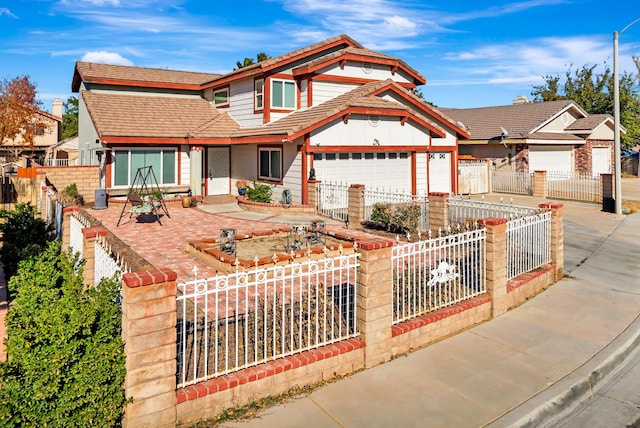 view of front of home featuring a garage