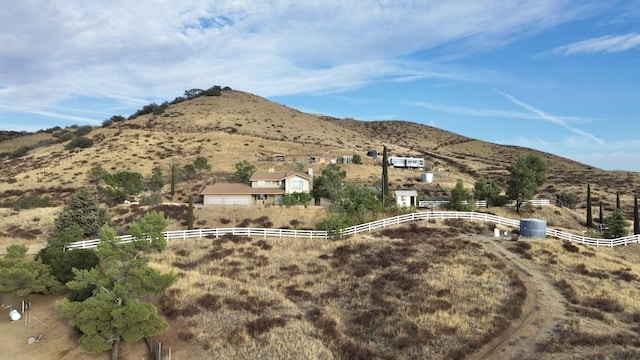 view of mountain feature with a rural view