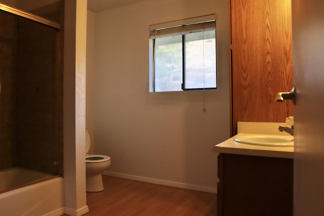 full bathroom with separate shower and tub, vanity, wood-type flooring, and toilet