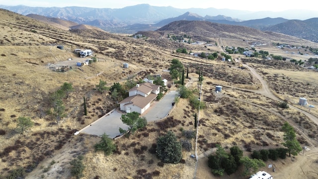 drone / aerial view featuring a mountain view