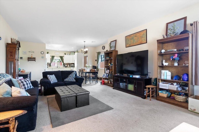 350 E Nugent St, Lancaster, CA 93535 - carpeted living area with a chandelier