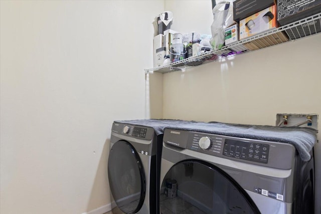 350 E Nugent St, Lancaster, CA 93535 - washroom featuring washer and dryer, baseboards, and tile patterned flooring