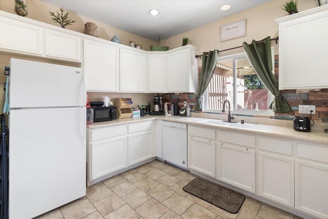 350 E Nugent St, Lancaster, CA 93535 - kitchen with white appliances, a sink, white cabinets, light countertops, and recessed lighting