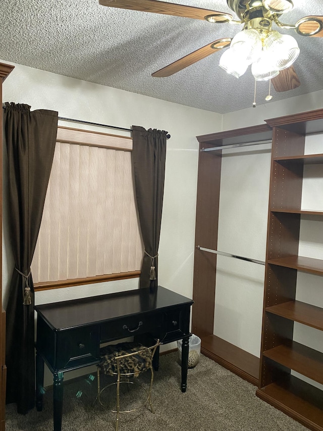 9755 E E Ave S Unit 12, Littlerock, CA 93543 - carpeted bedroom featuring a ceiling fan and a textured ceiling