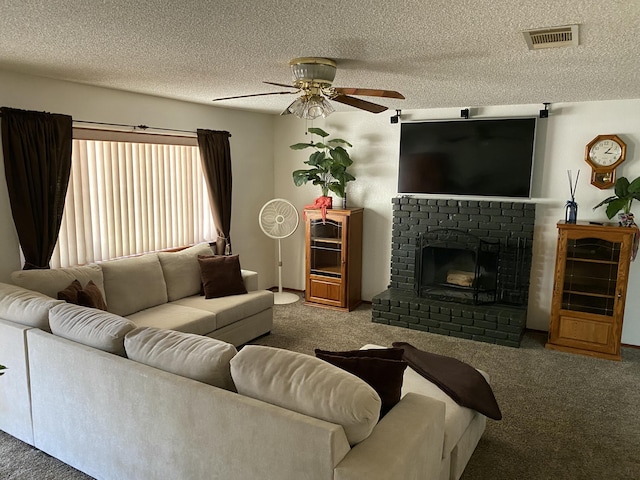 9755 E E Ave S Unit 12, Littlerock, CA 93543 - carpeted living room featuring ceiling fan, a textured ceiling, and a brick fireplace
