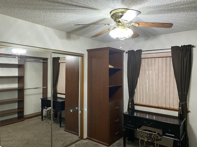 9755 E E Ave S Unit 12, Littlerock, CA 93543 - bedroom featuring carpet, a textured ceiling, a closet, and a ceiling fan