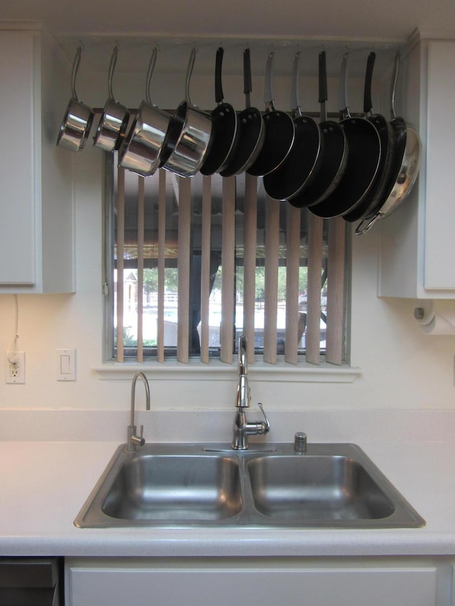 9755 E E Ave S Unit 12, Littlerock, CA 93543 - kitchen view of a sink, white cabinets, and light countertops