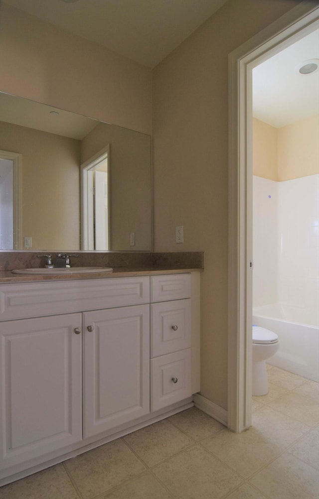 full bathroom featuring vanity, toilet, and tub / shower combination