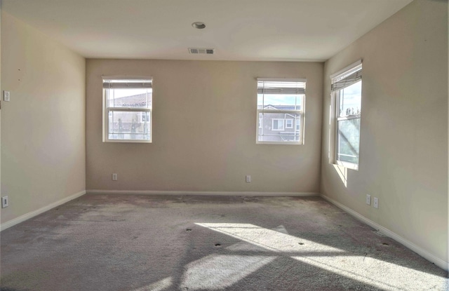 unfurnished room with carpet