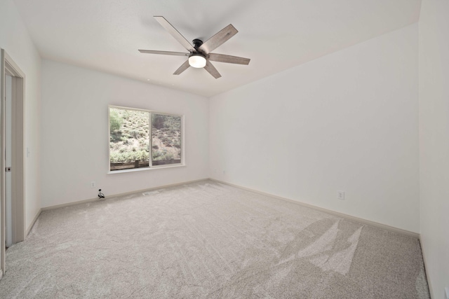 24481 Jacaranda Dr, Tehachapi, CA 93561 - carpeted spare room with a ceiling fan and baseboards