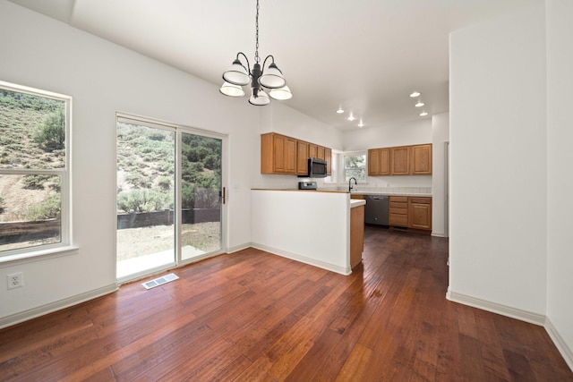 24481 Jacaranda Dr, Tehachapi, CA 93561 - kitchen featuring stainless steel dishwasher, a chandelier, dark wood-type flooring, a sink, and healthy amount of natural light