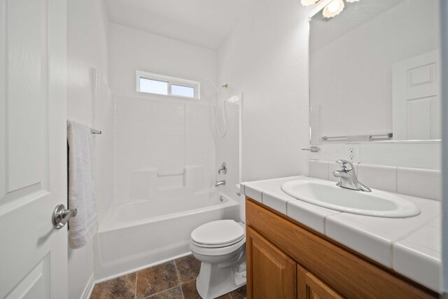24481 Jacaranda Dr, Tehachapi, CA 93561 - full bath with vanity, bathtub / shower combination, toilet, and stone finish flooring