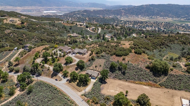24481 Jacaranda Dr, Tehachapi, CA 93561 - aerial overview of property's location featuring a mountainous background