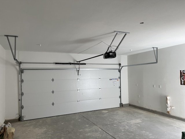 garage featuring a garage door opener