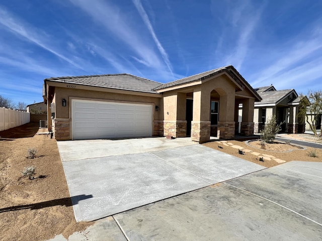 view of front of house with a garage