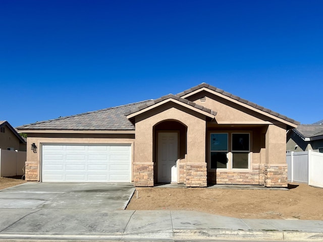 single story home with a garage