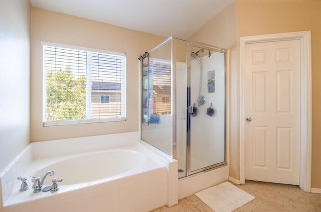 bathroom featuring separate shower and tub and tile patterned flooring