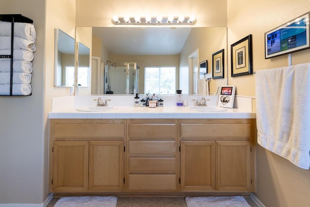 bathroom featuring a shower with door, vanity, and lofted ceiling